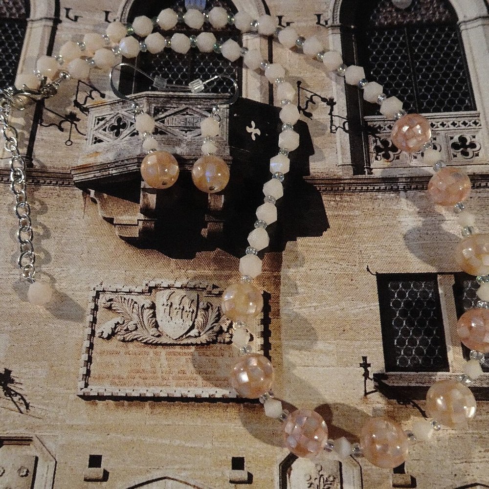 Handmade necklace/earring set in faceted pink with silver-plated findings